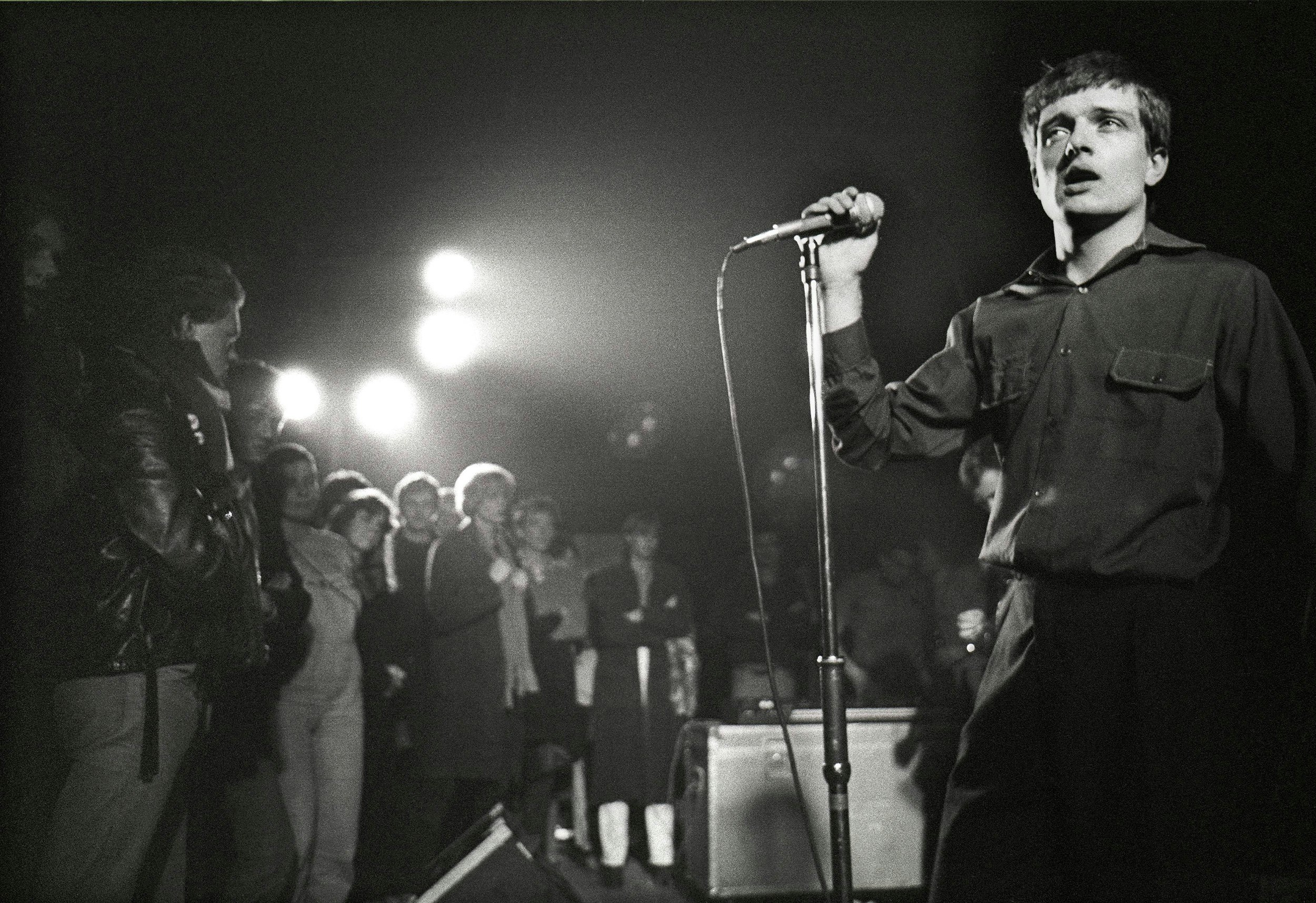 Joy Division’s Ian Curtis at the Lantaren in Rotterdam, Netherlands, circa 1980. Photo by Rob Verhorst/Redfern